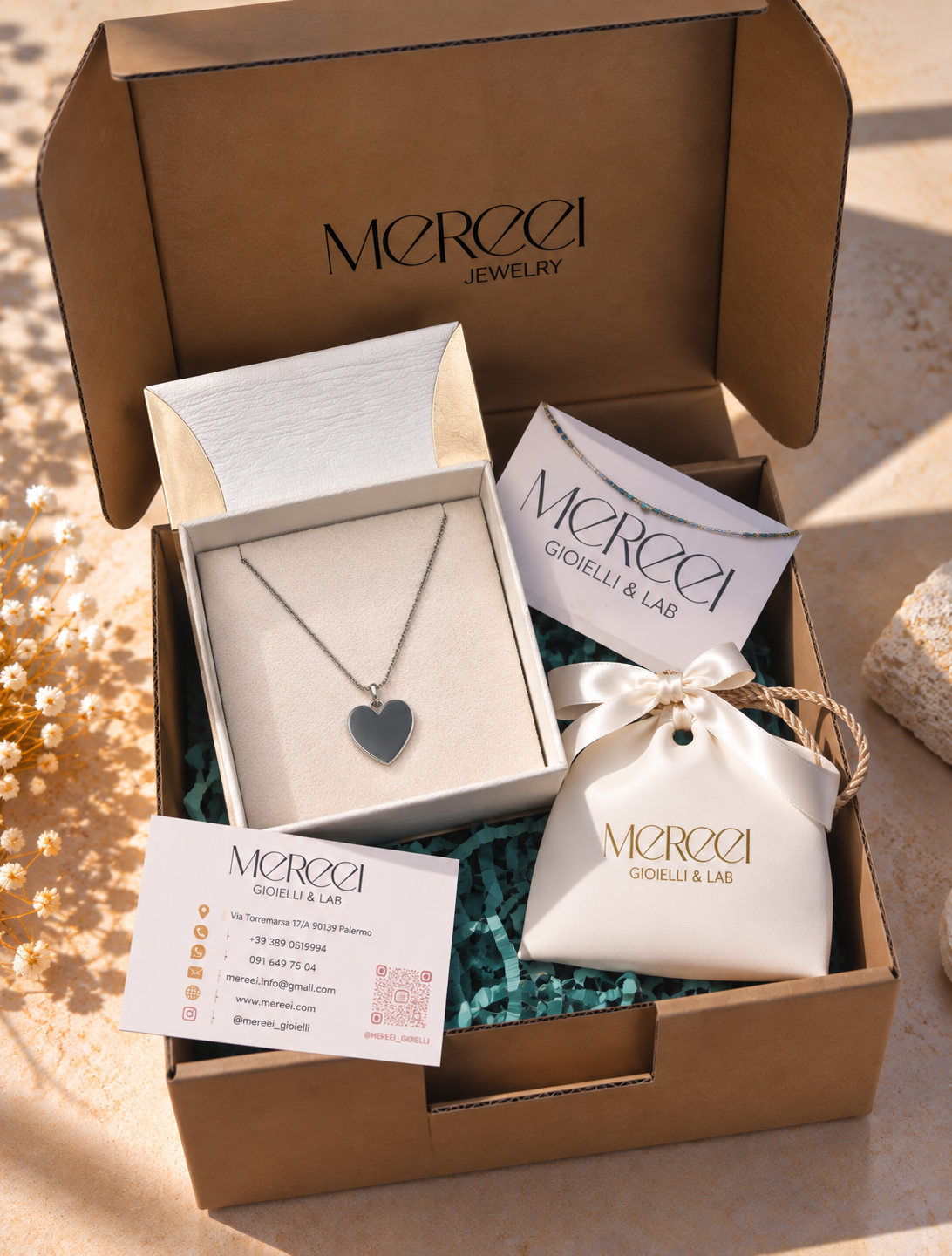 Collana con ciondolo cuore specchiato