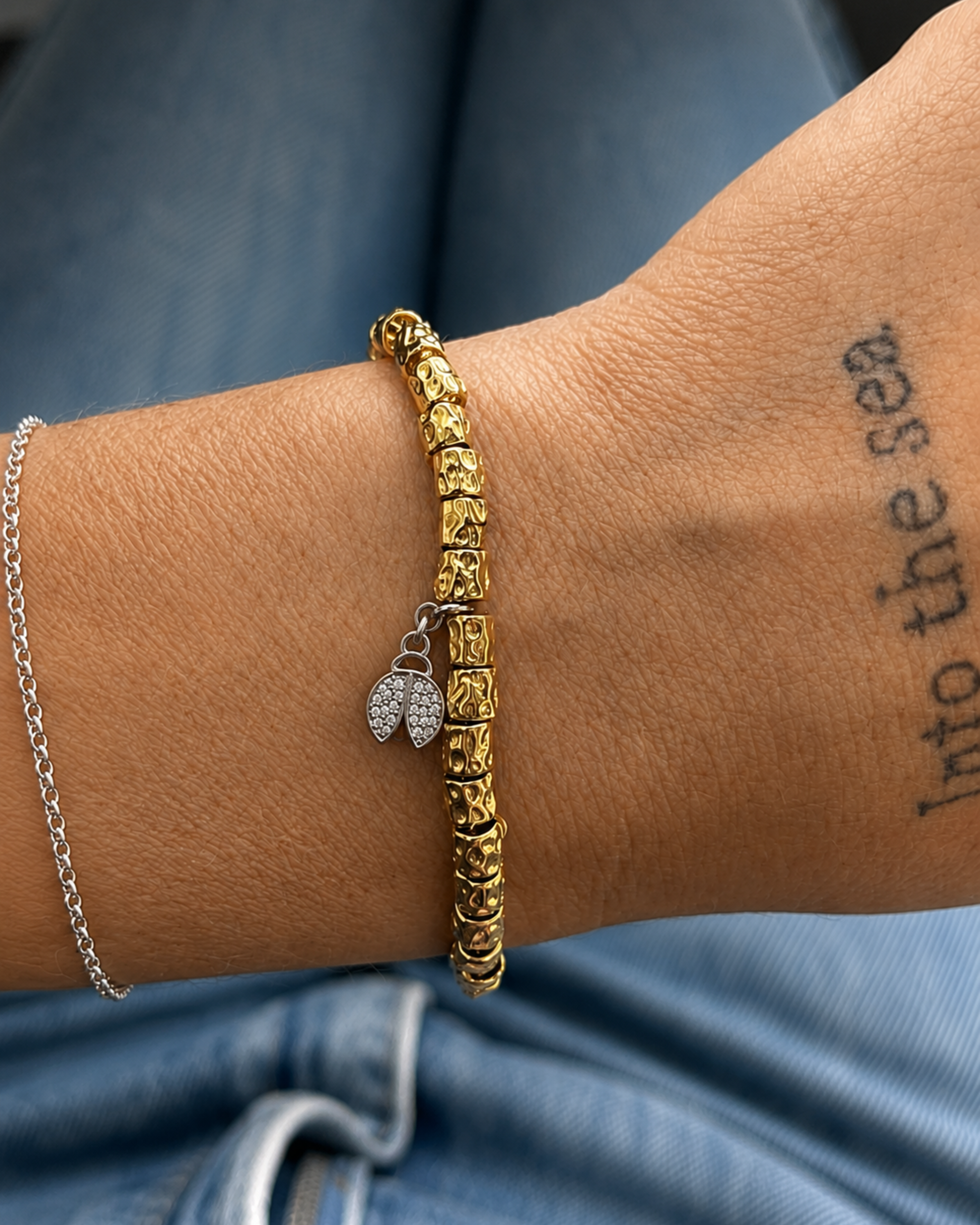 Bracciale con pepite e coccinella