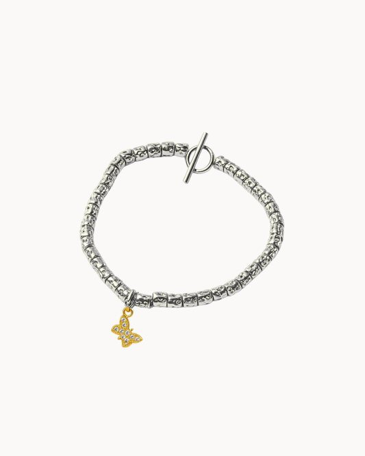 Bracciale con pepite e farfalla